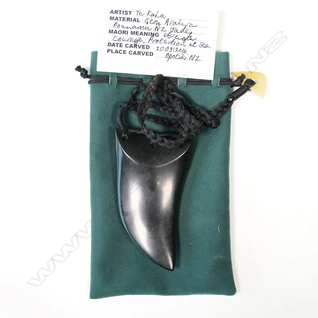 Te Kaha large carved pounamu rei niho (eye tooth) pendant, Image 1++